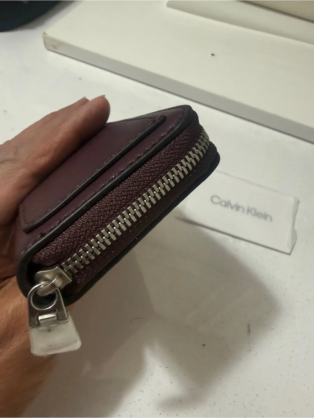 Calvin Klein Burgundy Zipper wallet with Embossed CK brand new